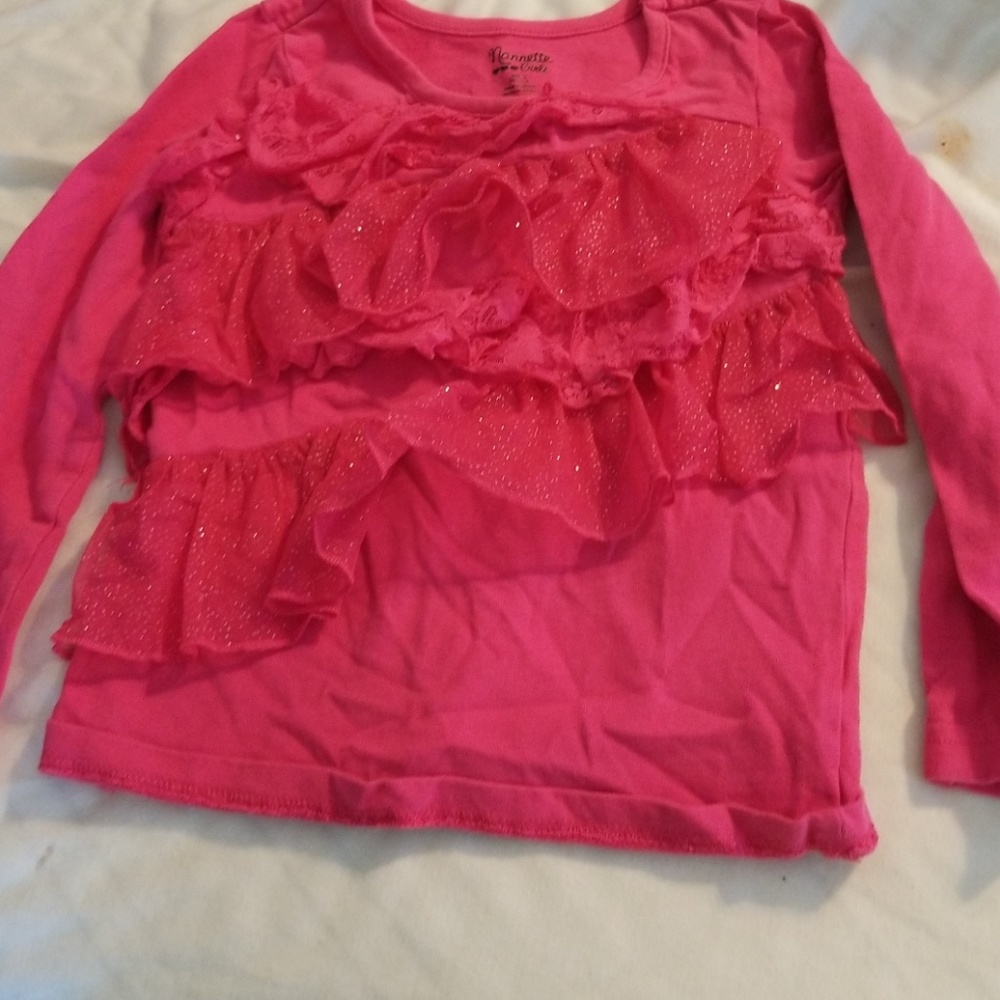 Pink shirt with ruffles
